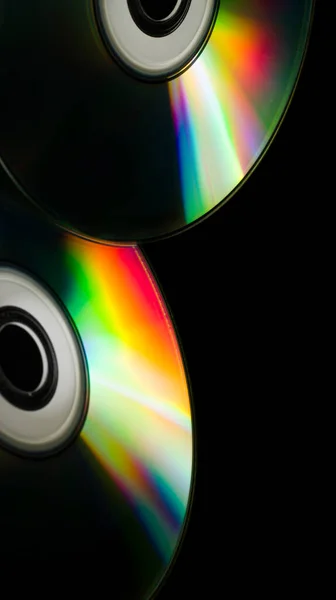 compact-discs on a black background