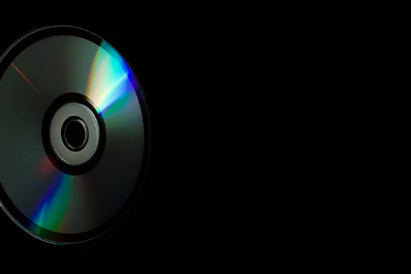 Compact Disc Mano Fondo Nero — Foto Stock