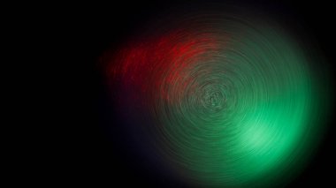 Dairesel bir rotasyonda yeşil ve kırmızı ışık parçacıkları