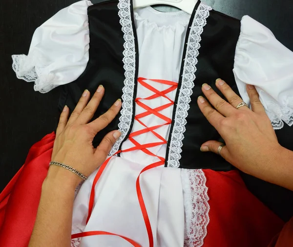 Black Red White Suit Girl Seamstress Decorates Suit Red Ribbon — Stock Photo, Image