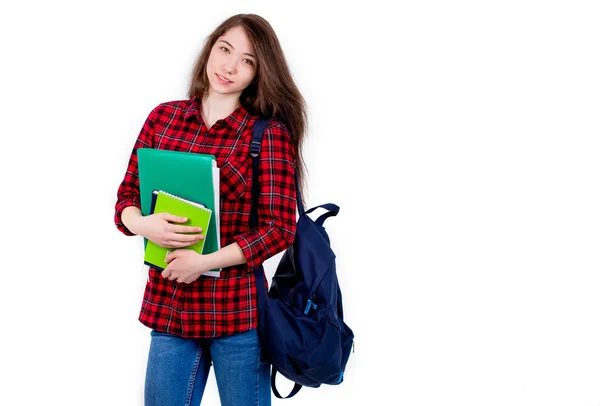 Hermosa colegiala chica, estudiante con libros de texto y mochila . Imagen de archivo