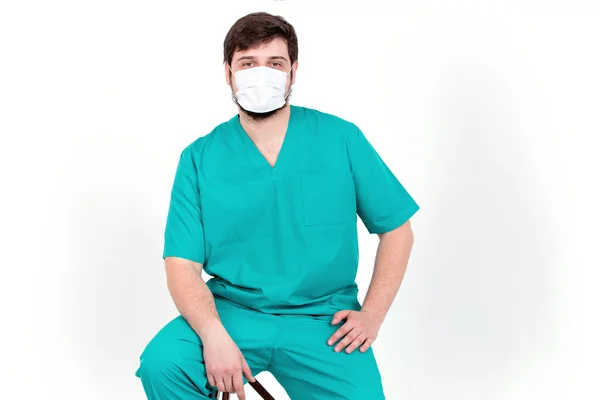 Doctor in de masker toont emotie. Op de witte achtergrond. — Stockfoto