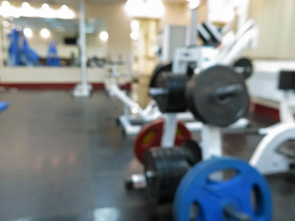 Imagem borrada abstrato de ginásio atlético interior para fitness com fundo bokeh — Fotografia de Stock