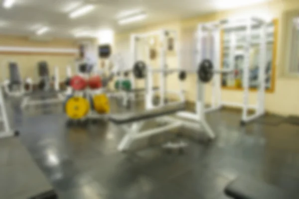İç atletik spor salonu için fitness bokeh arka plan ile soyut bulanık görüntü — Stok fotoğraf