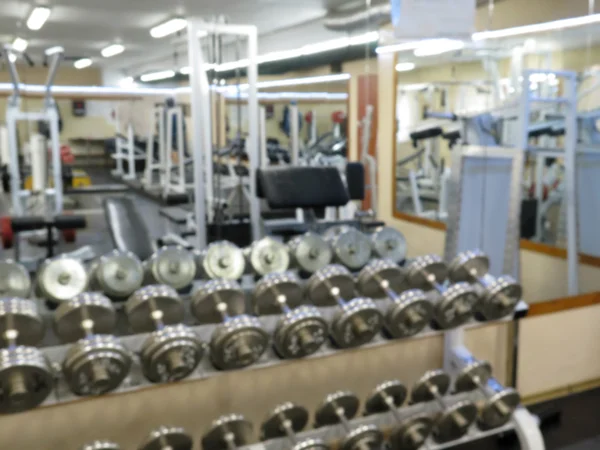 Abstraktes verschwommenes Bild der inneren Turnhalle für Fitness mit Bokeh-Hintergrund — Stockfoto