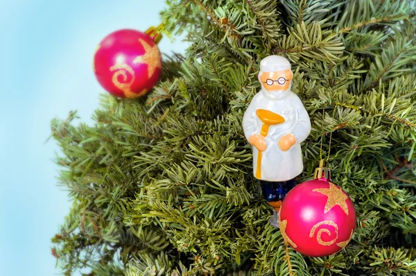 Yeni yıl Noel tebrik kartı ağaç, tıp doktoru oyuncaklar