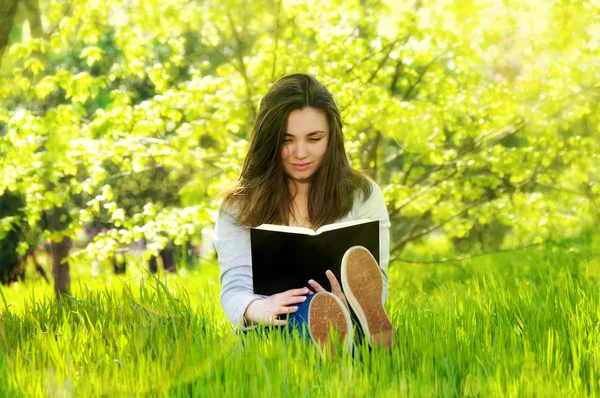 Image result for picture of a woman happily reading a book