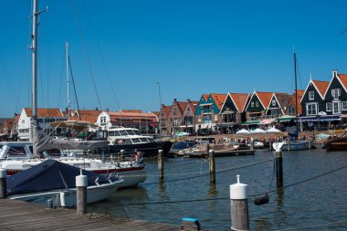 houses and boats in Volendam clipart