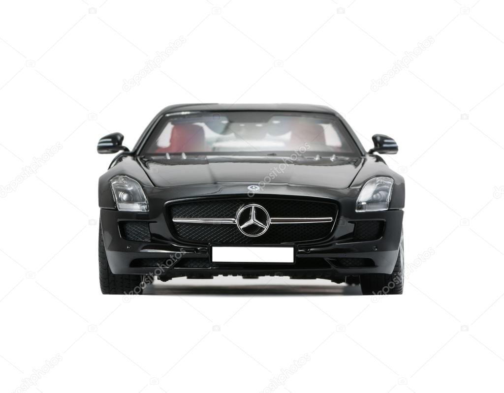 ALMATY, KAZAKHSTAN - june 22, 2014 - Collectible toy car Mercedes-Benz SLS Sedan  isolated on white background