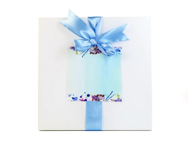 Gift boxe with blue ribbons on a white background — Stock Photo, Image