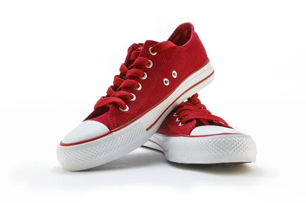 Scarpe rosse su sfondo bianco (nessun nome, nessuna marca, made in Cnina ) — Foto Stock