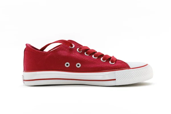 Red sport shoes on a white background(no name,no brand,made in C — Stock Photo, Image