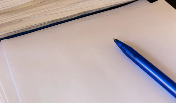 Pen on a white sheet — Stock Photo, Image