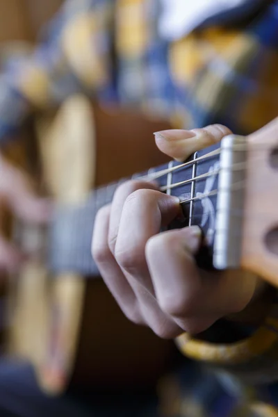 Young guy playing classical guitar — Stock Photo, Image