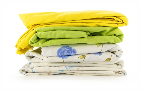 Stack of linen on a white background — Stock Photo, Image