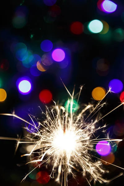 Brillo iluminado sobre unas guirnaldas de fondo (enfoque suave ) — Foto de Stock