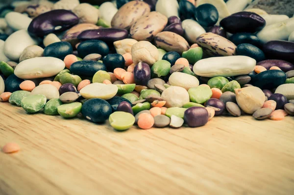 Legumes on wood, close-up, background, vintag — Stock Photo, Image