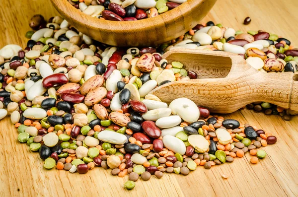 Legumes on wood, closeup, backgroun — Stock Photo, Image