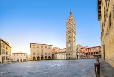 Pistoia, Italy. Panorama of Piazza del Duomo square with old Town Hall and Cathedral of San Zeno on sunrise clipart