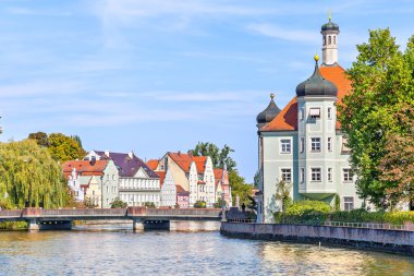 Isar river and bavarian style buildings in Landshut clipart