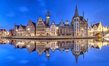 Ghent skyline reflecting in water, Belgium clipart
