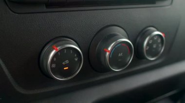 Tokmak iklim kontrolü, hava ayarları için dönüş kadranı, ayarlanabilir iklim kontrol düğmesi olan kabin konfor özelliği, araç kabininde sıcaklık düzenlemesi için dokunsal geri besleme dönüş anahtarı