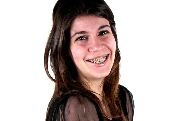 Studio shot of a young lady with dental appliance — Stock Photo, Image