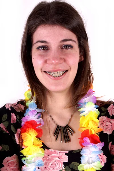 Studio shot of a young woman with colorful garland — Stock Photo, Image