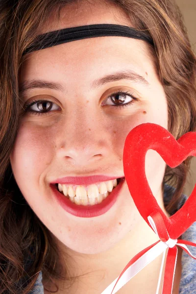 Girl with red heart — Stock Photo, Image