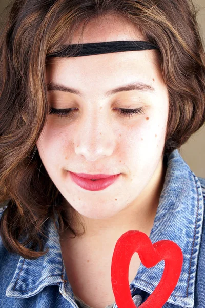 Girl with red heart — Stock Photo, Image