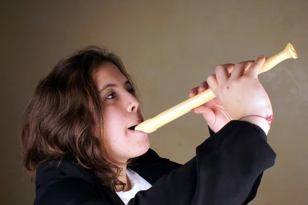 Girl with flute — Stock Photo, Image