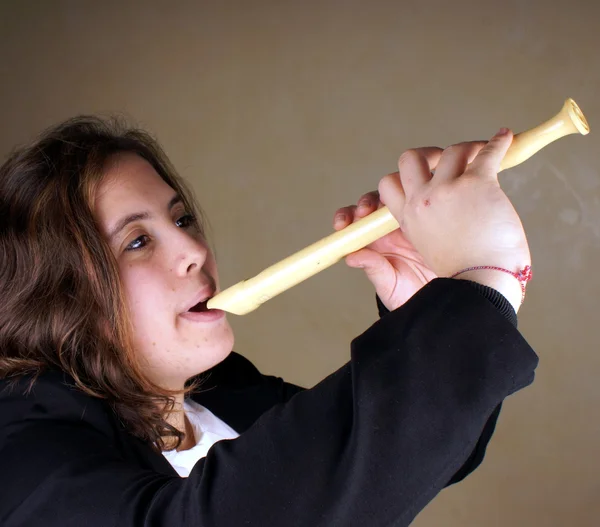 Girl with flute — Stock Photo, Image