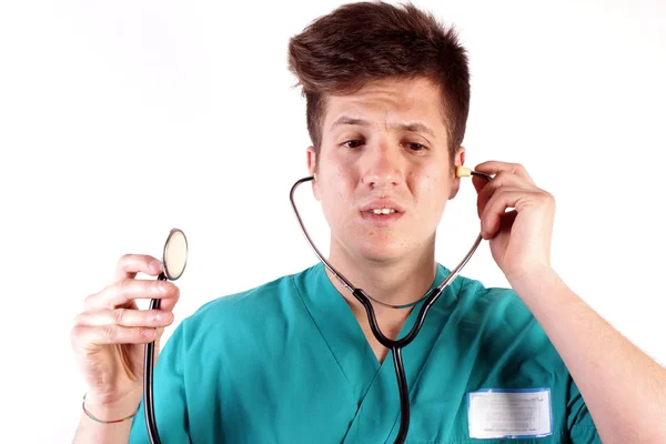 Estudio de un joven con ropa médica — Foto de Stock