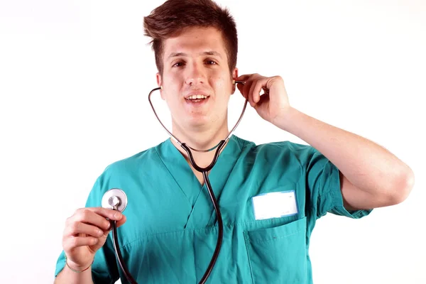 Studio shot of a young man with medical clothes — Stock Photo, Image