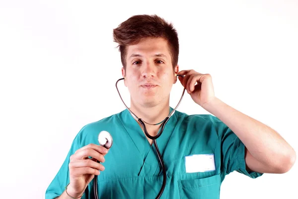 Studio shot of a young man with medical clothes — Stock Photo, Image