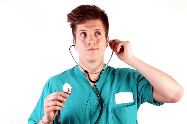Studio shot of a young man with medical clothes — Stock Photo, Image