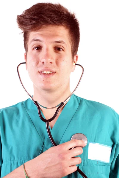 Estudio de un joven con ropa médica — Foto de Stock