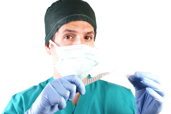 Retrato de um jovem vestindo roupas médicas — Fotografia de Stock