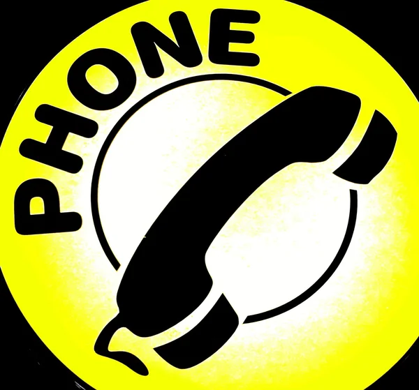 Primo piano di un segnale telefonico nero e giallo — Foto Stock