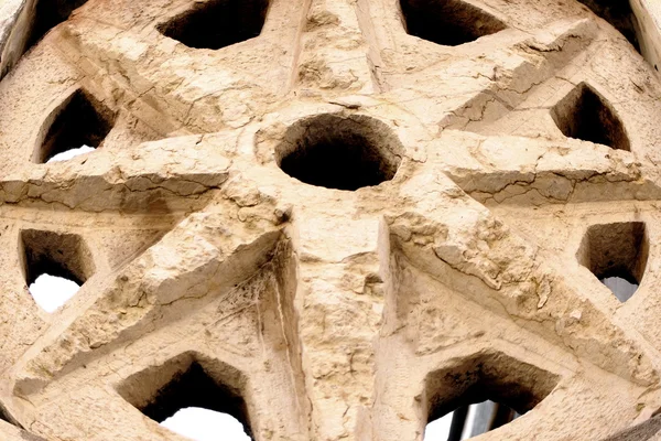 Dettaglio di una vecchia rosetta in pietra italiana — Foto Stock