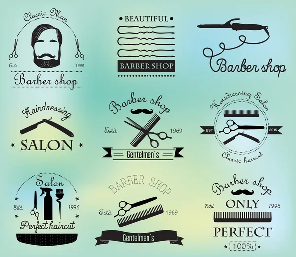 Set of retro barber shop logo — Stock Vector