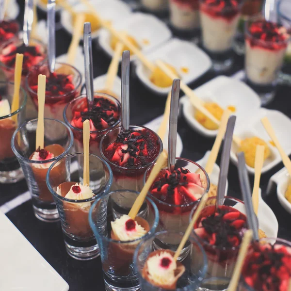 Beautifully decorated catering banquet table with different food snacks