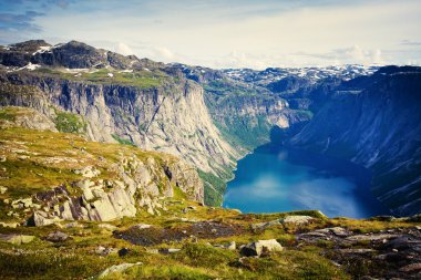 Beautiful norwegian landscape with mountains on the the way to trolltunga clipart