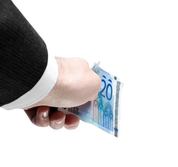 La mano del hombre sosteniendo veinte billetes de euro — Foto de Stock