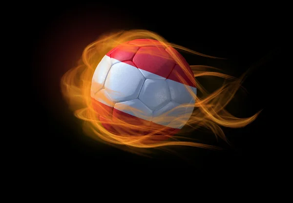 Fußball mit der österreichischen Nationalflagge, die eine Flamme bildet. — Stockfoto