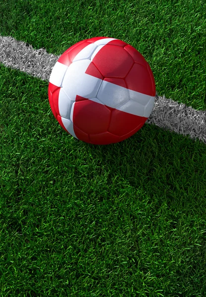 Soccer ball and national flag of Denmark,  green grass — Stock Photo, Image