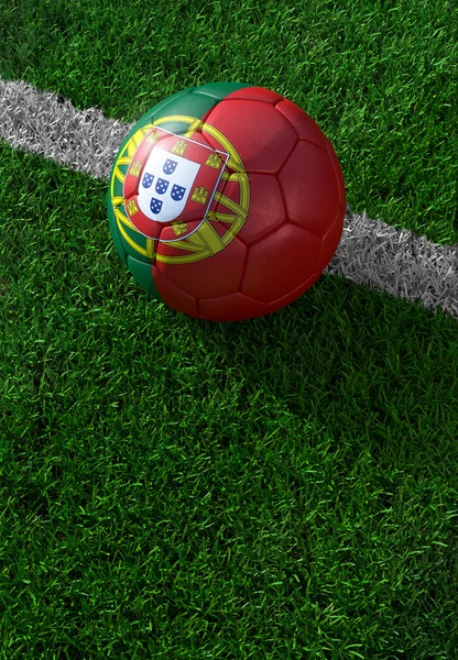 Balón de fútbol y bandera nacional de Portugal, hierba verde —  Fotos de Stock