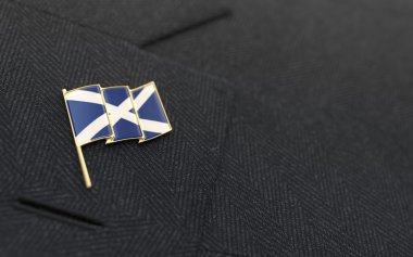 Scotland flag lapel pin on the collar of a business suit clipart