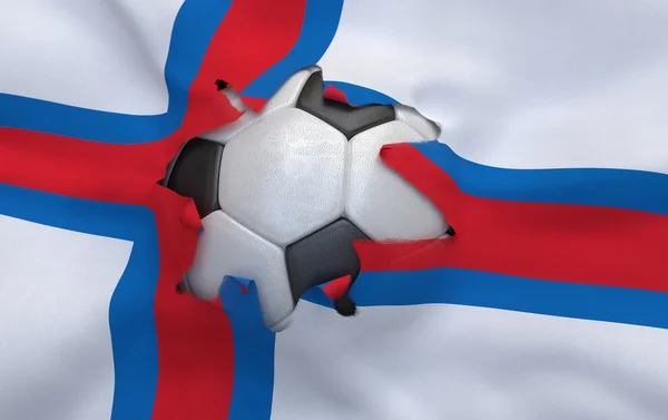 Le trou dans le drapeau des îles Féroé et le ballon de football — Photo