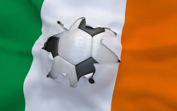 El hoyo en la bandera de Irlanda y la pelota de fútbol — Foto de Stock